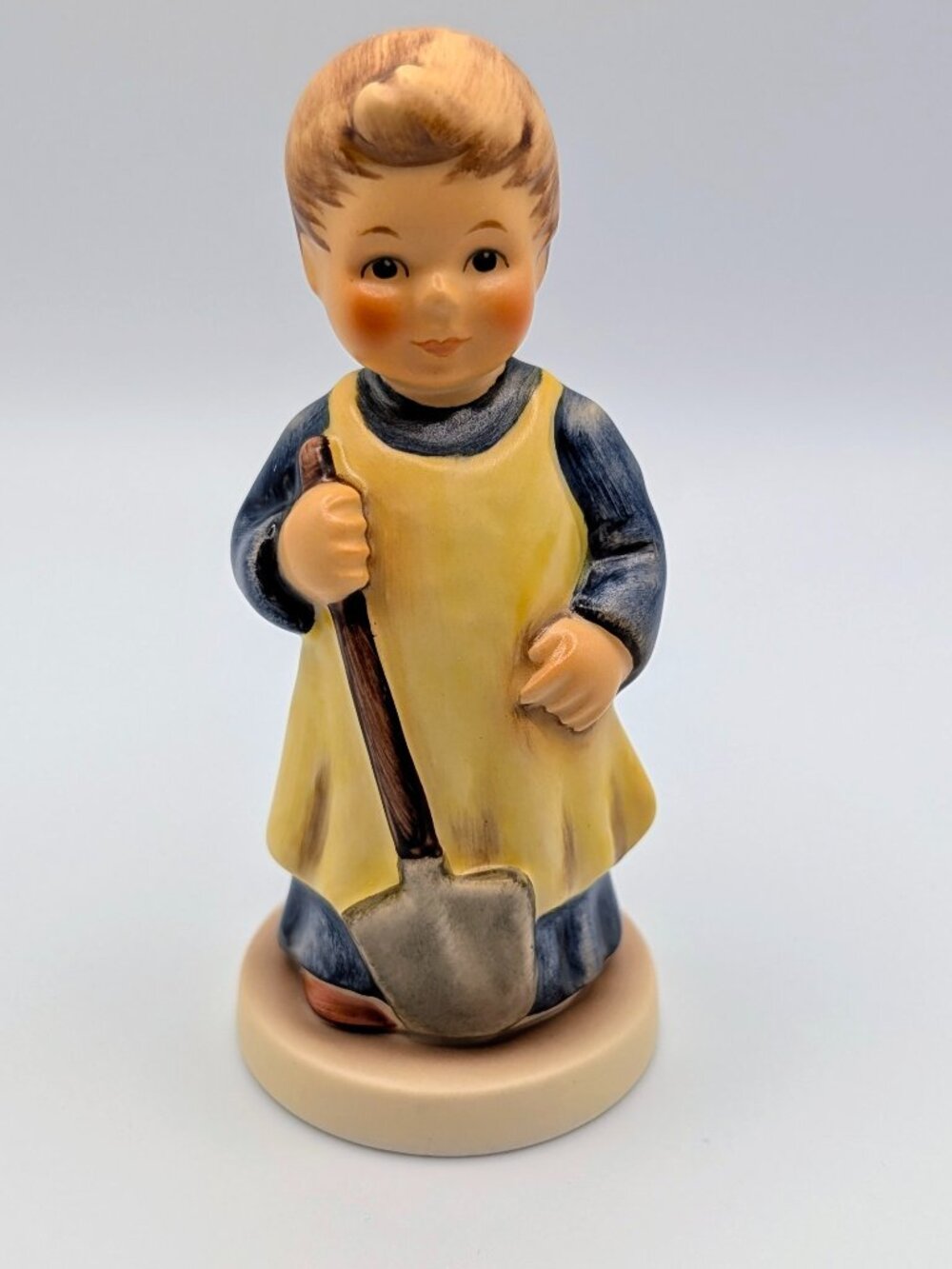 M.I. Hummel figurine is titled "Garden Treasures" - #727